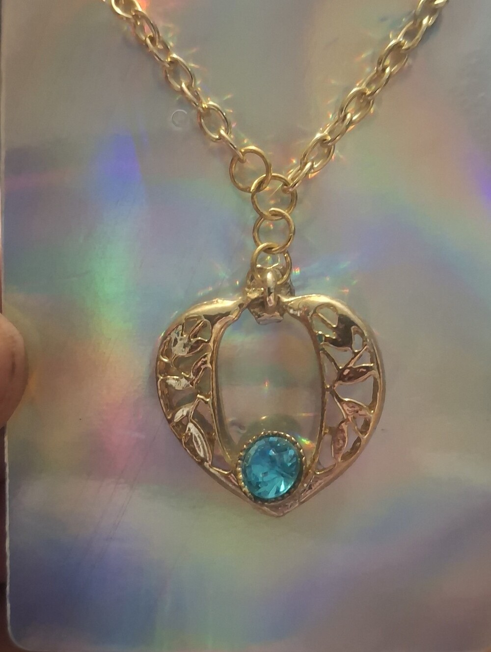 Gold Heart Pendant Necklace with Blue Crystal
